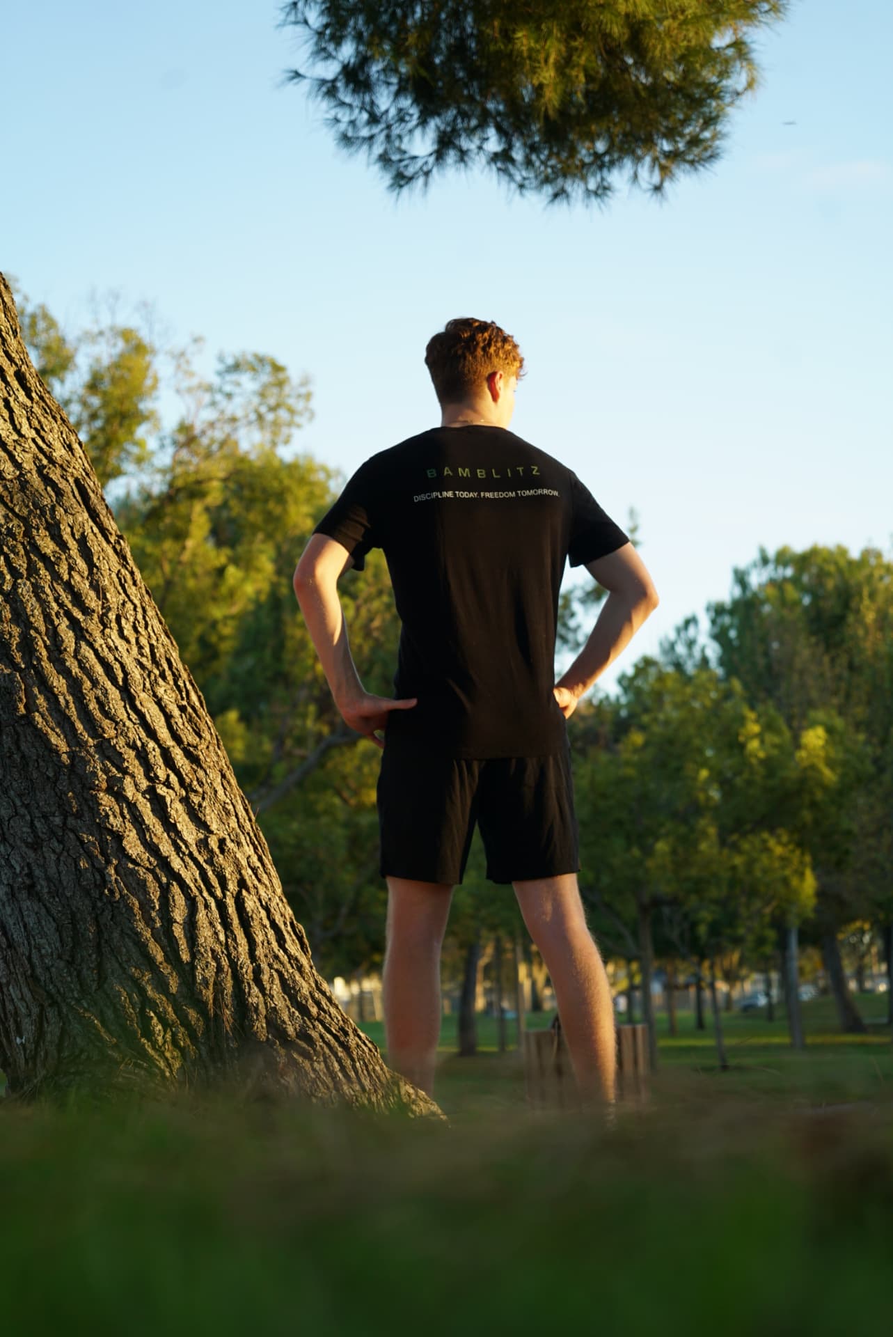 Performance Tee worn outdoors, back view